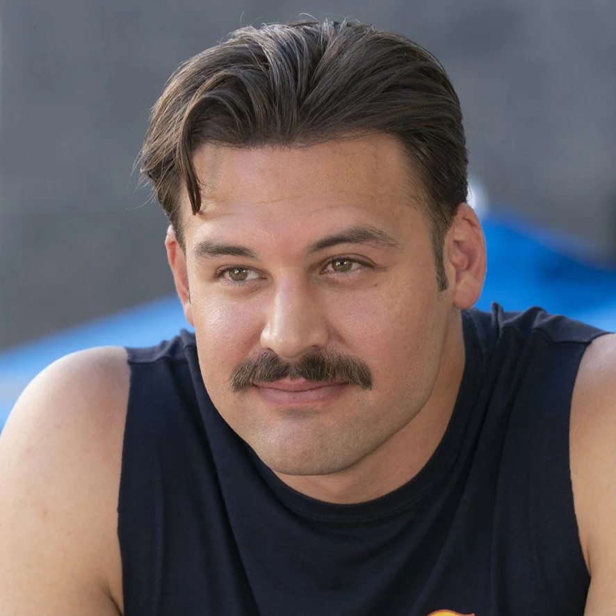 Eddie's profile picture, a picture of him with a moustache