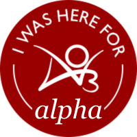 Circular badge with the words 'I was here for alpha' with an AO3 logo
